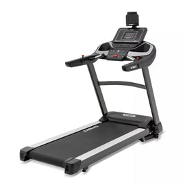 Treadmill with digital display on a white background